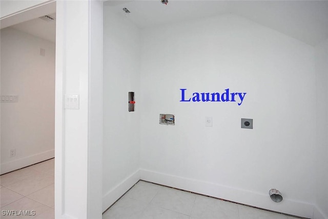 laundry area featuring hookup for a washing machine, light tile patterned floors, and hookup for an electric dryer