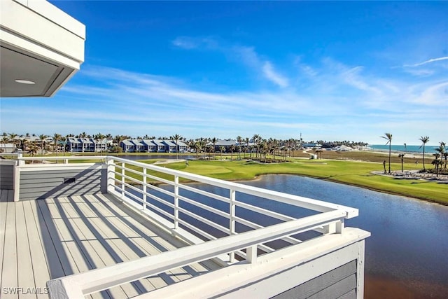 deck featuring a water view