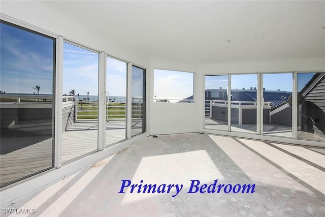 sunroom / solarium featuring a healthy amount of sunlight