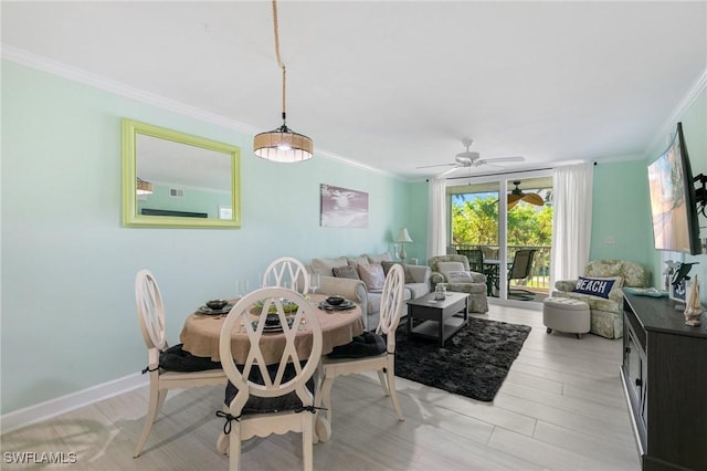 dining space featuring ceiling fan, light hardwood / wood-style floors, and ornamental molding