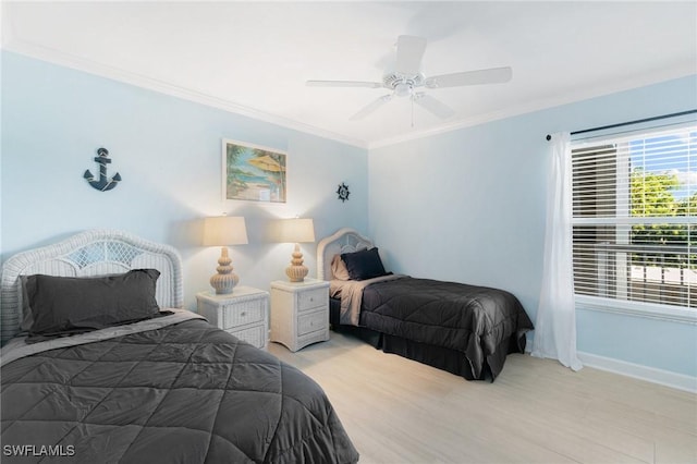 bedroom with light wood-type flooring, ceiling fan, and ornamental molding