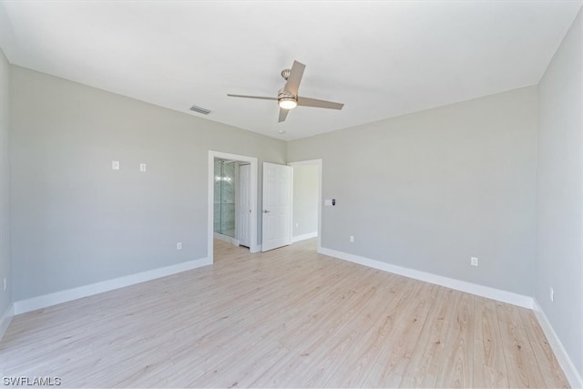 empty room with ceiling fan and light wood-type flooring