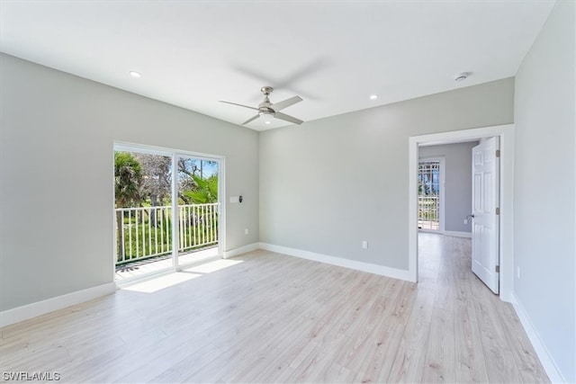 unfurnished room with light hardwood / wood-style flooring and ceiling fan