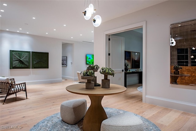 interior space with recessed lighting, light wood-type flooring, and baseboards