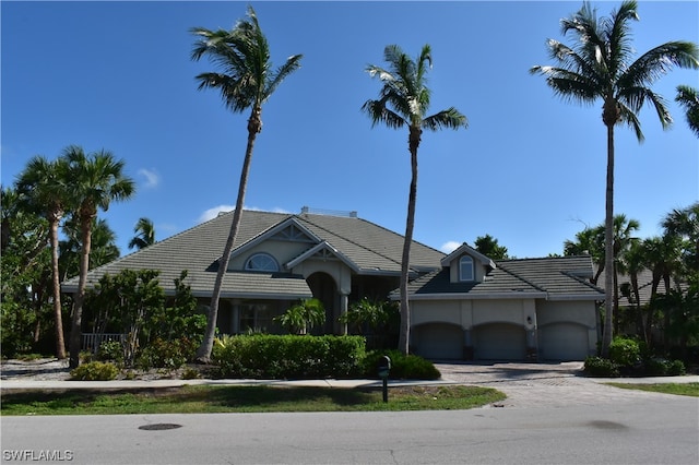 view of front of property with a garage