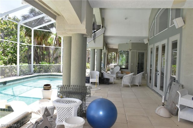 exterior space with a lanai, a patio area, and french doors