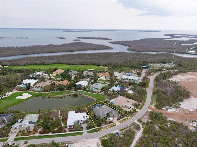 bird's eye view with a water view