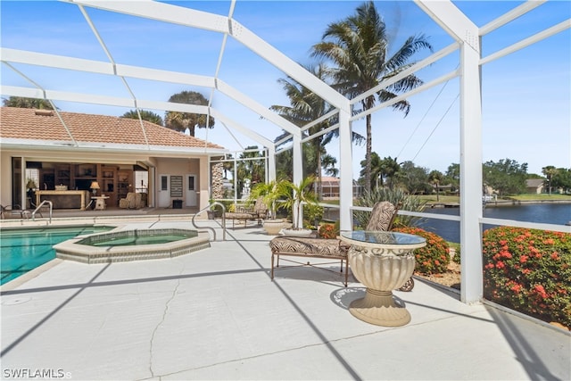 view of swimming pool featuring an in ground hot tub, a water view, glass enclosure, and a patio area