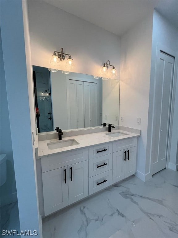 bathroom with tile floors and dual vanity