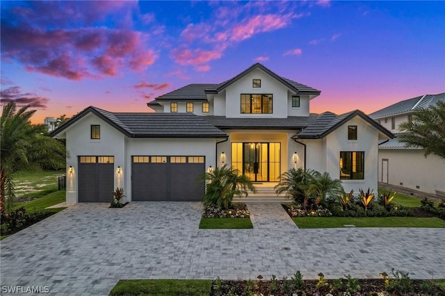 view of front of home featuring a garage