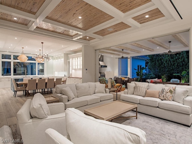 living room with a chandelier, beamed ceiling, wood ceiling, and light wood-type flooring