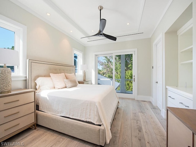 bedroom featuring ceiling fan, light hardwood / wood-style floors, and access to exterior