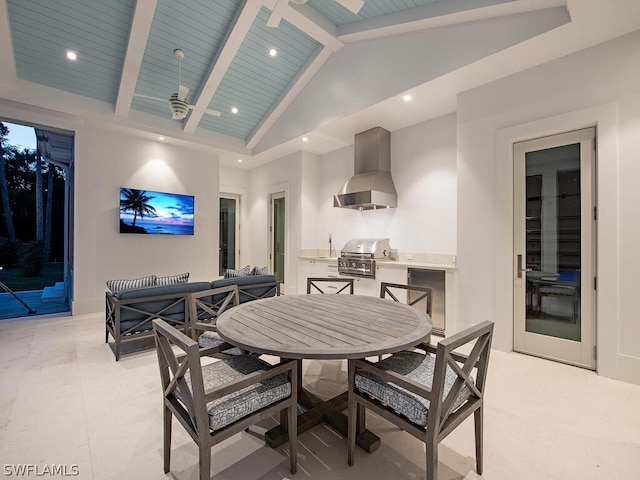 dining room with beamed ceiling, wooden ceiling, and high vaulted ceiling