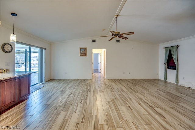 unfurnished room with ornamental molding, lofted ceiling, ceiling fan, and light wood-type flooring