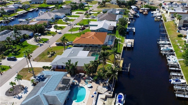 drone / aerial view with a water view