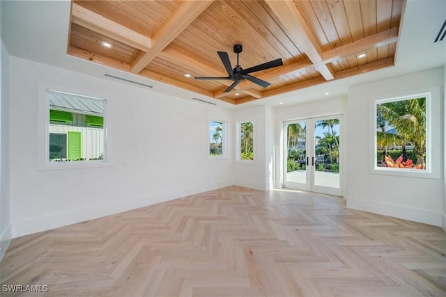 empty room featuring ceiling fan, wood ceiling, french doors, baseboards, and beam ceiling