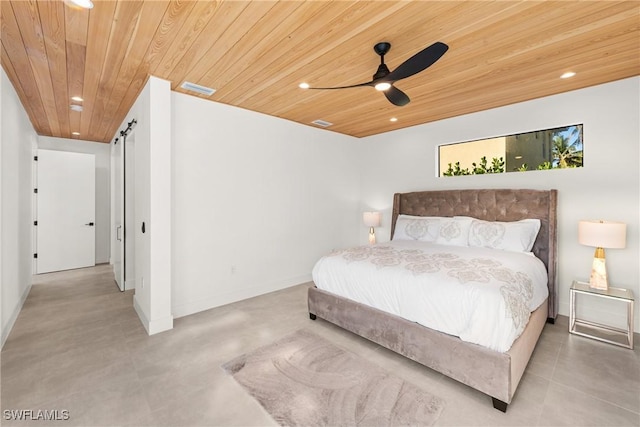 bedroom featuring recessed lighting, wood ceiling, and a barn door