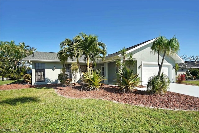 ranch-style home with a front yard and a garage