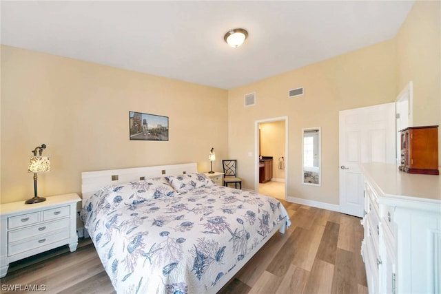 bedroom featuring light hardwood / wood-style floors