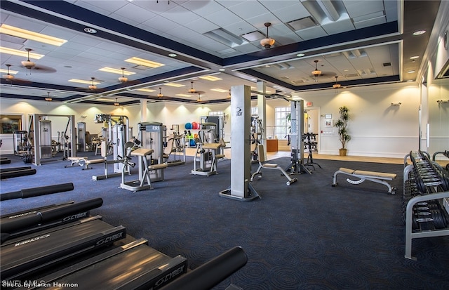 gym with ceiling fan and carpet floors