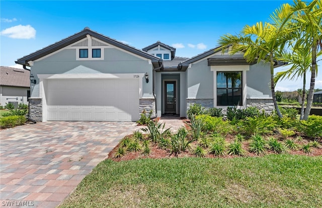 view of front of property with a garage