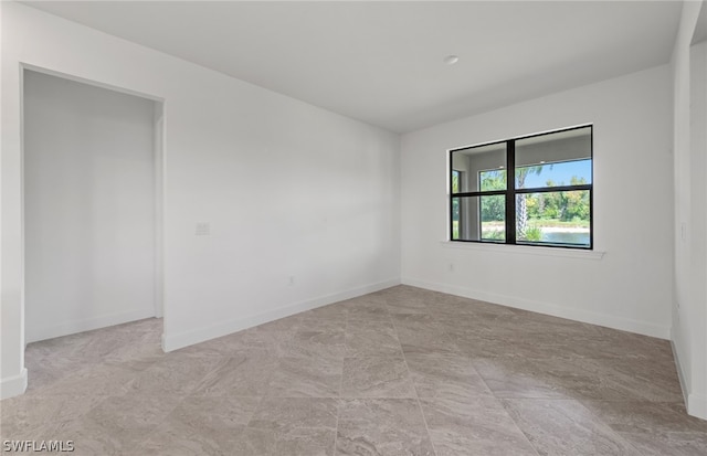 view of tiled spare room