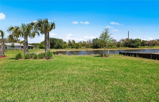 view of yard with a water view