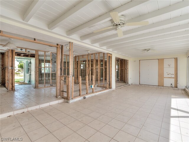230 Randy Ln, Fort Myers Beach, FL 33931 - tiled spare room featuring ceiling fan and beamed ceiling
