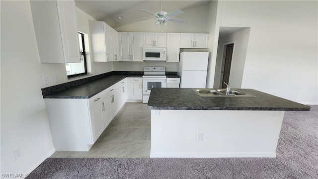 kitchen featuring light carpet, white cabinetry, white appliances, and sink