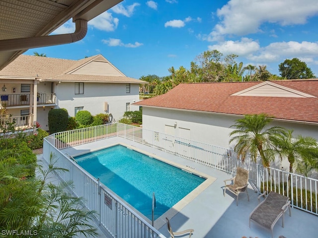 view of swimming pool featuring a patio area