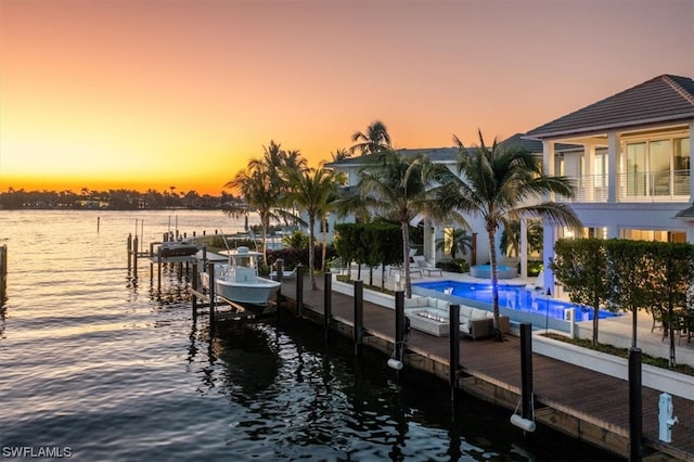 dock area with a water view