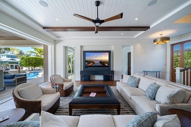 interior space with hardwood / wood-style floors, ceiling fan, wood ceiling, and beamed ceiling