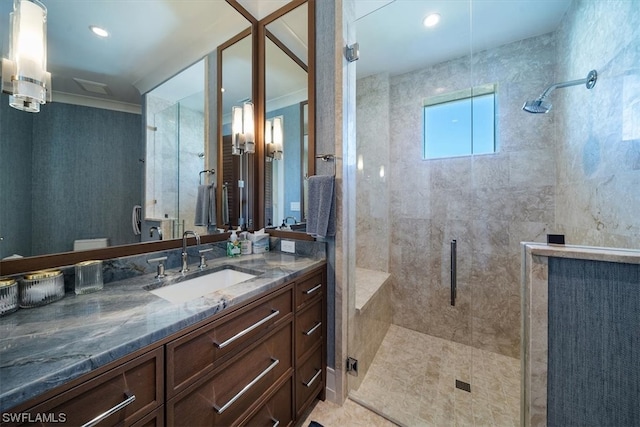 bathroom with tile patterned flooring, vanity, and a shower with shower door