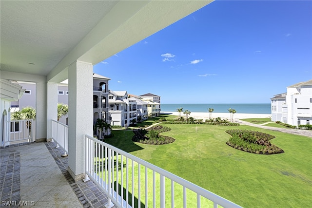 balcony featuring a water view