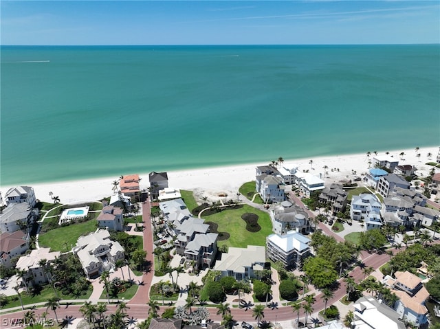 aerial view featuring a water view and a view of the beach