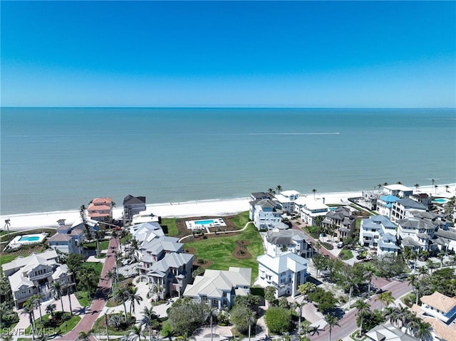 birds eye view of property with a residential view and a water view