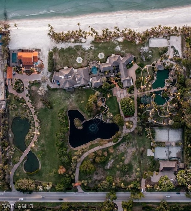 birds eye view of property featuring a water view