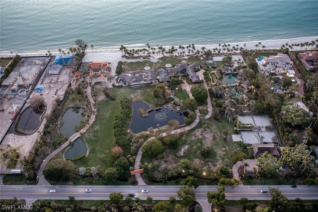 aerial view featuring a water view and a view of the beach