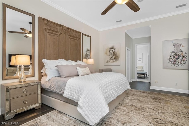 bedroom with ceiling fan, dark hardwood / wood-style flooring, and ornamental molding