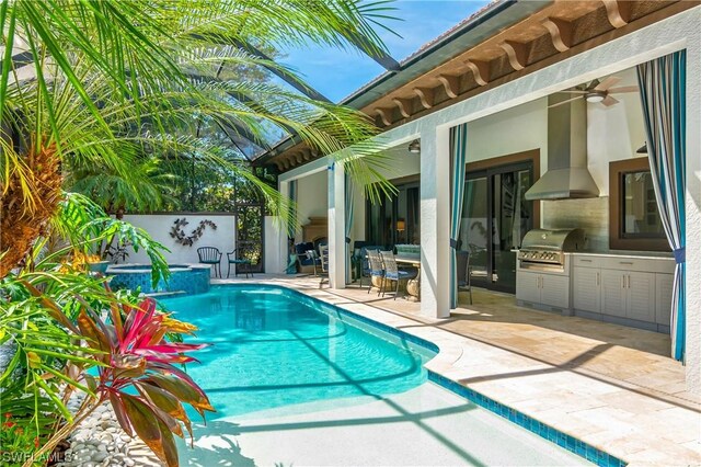 view of swimming pool featuring grilling area, an outdoor kitchen, ceiling fan, an in ground hot tub, and a patio area