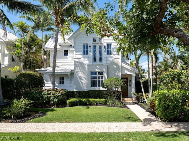 view of front of home with a front lawn