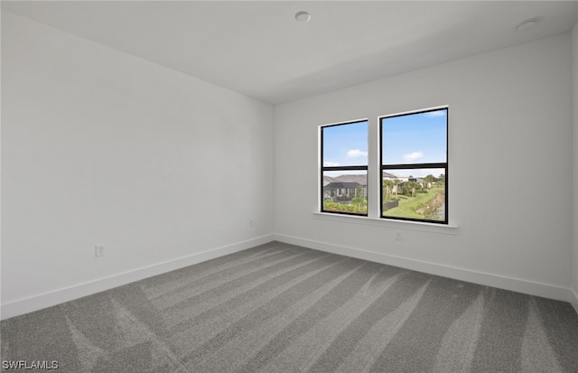 unfurnished room with carpet