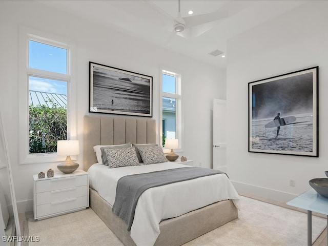 bedroom featuring multiple windows