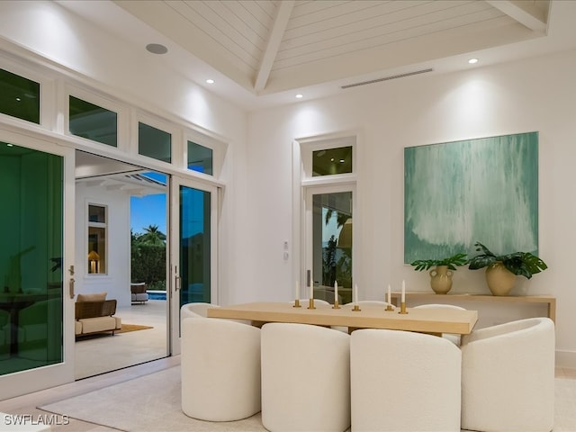 interior space with beam ceiling, wooden ceiling, and high vaulted ceiling