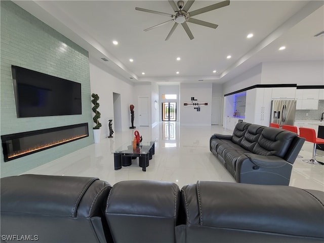 living room with ceiling fan