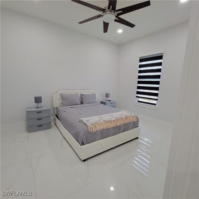 bedroom featuring ceiling fan