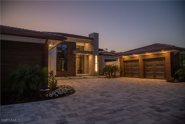 modern home featuring a garage