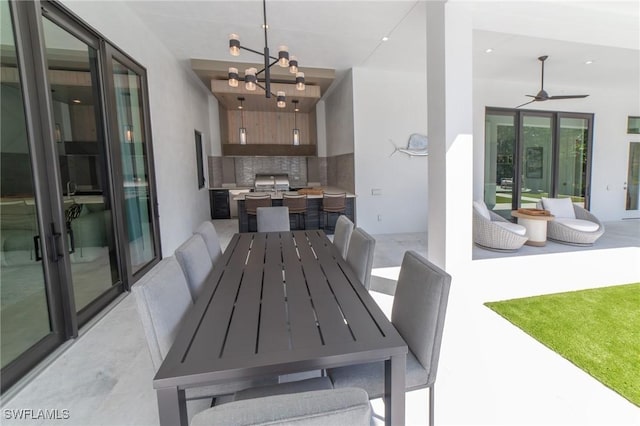 dining space with an inviting chandelier