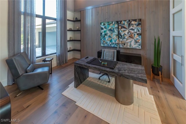 home office with light wood-type flooring