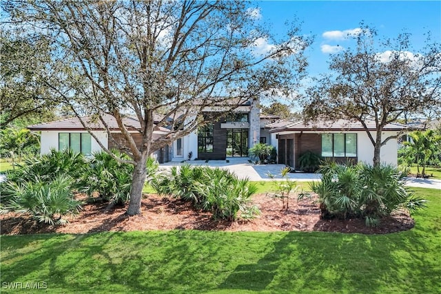 exterior space with a lawn